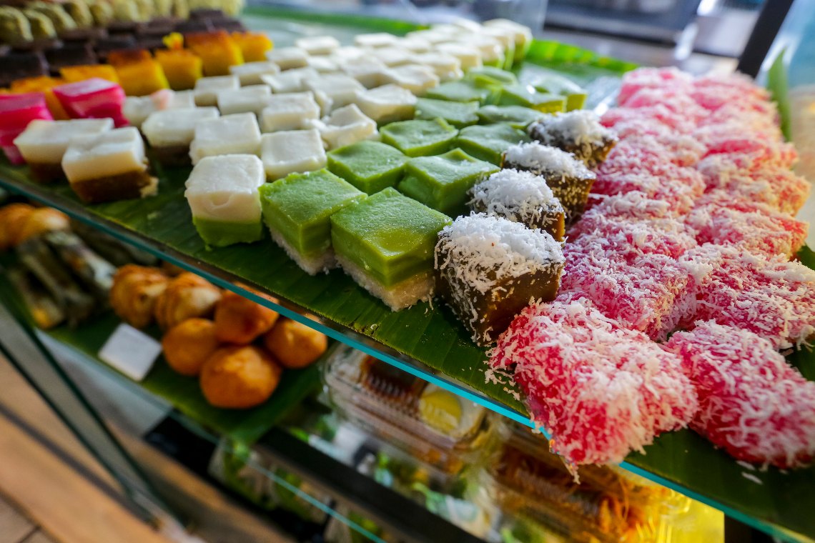A row of colourful kueh